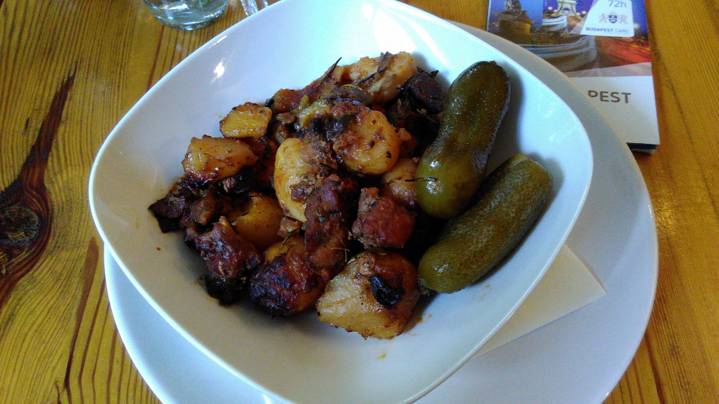 Roast with potatoes and pickles