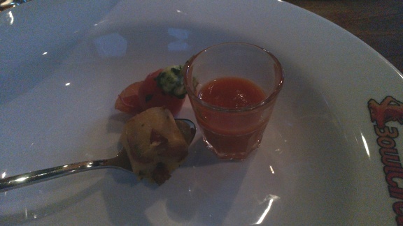 Tomato soup shot, bacon and potato roll at Mercur