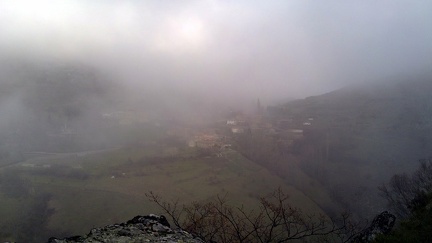 View of Valdorria and its peak among the fog